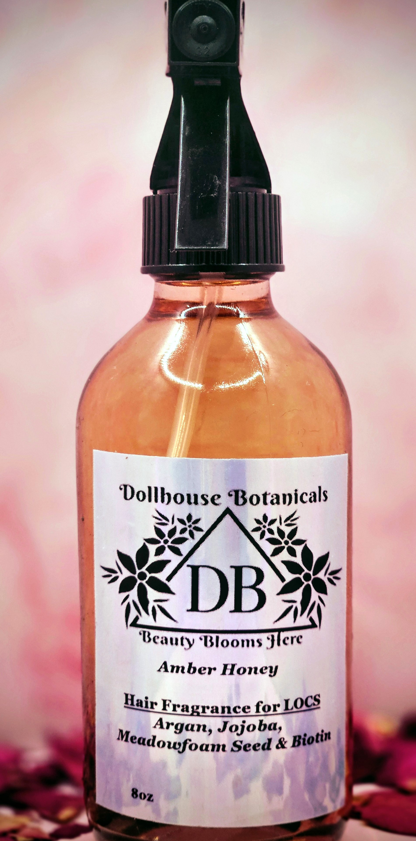 Dollhouse Botanicals Amber Honey Hair Fragrance for locs botanical oil in pink glass bottle with black sprayer