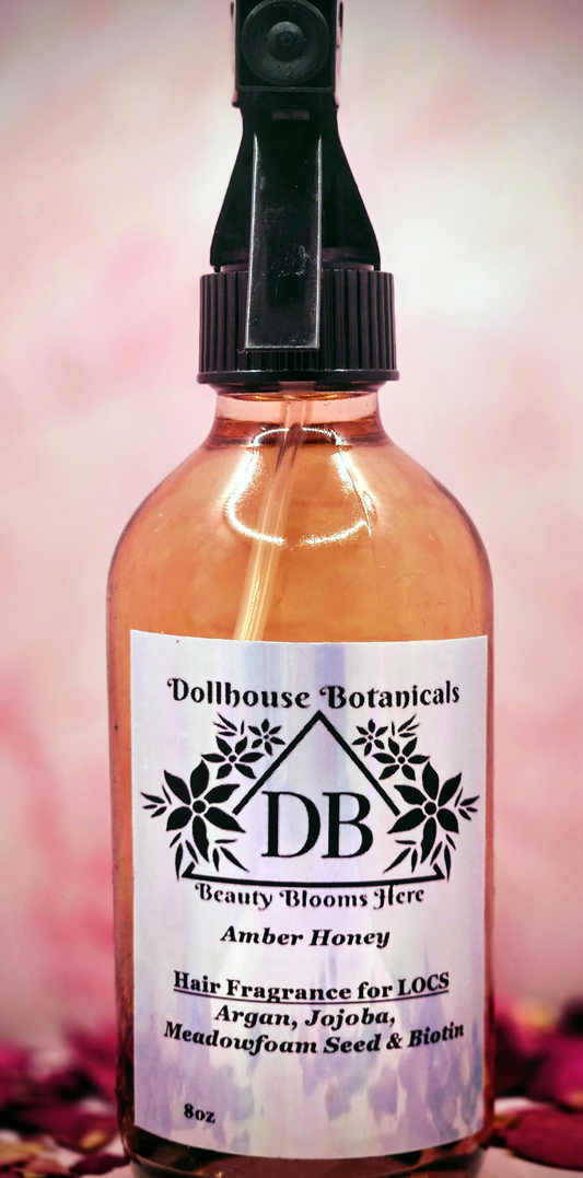 Dollhouse Botanicals Amber Honey Hair Fragrance for locs botanical oil in pink glass bottle with black sprayer