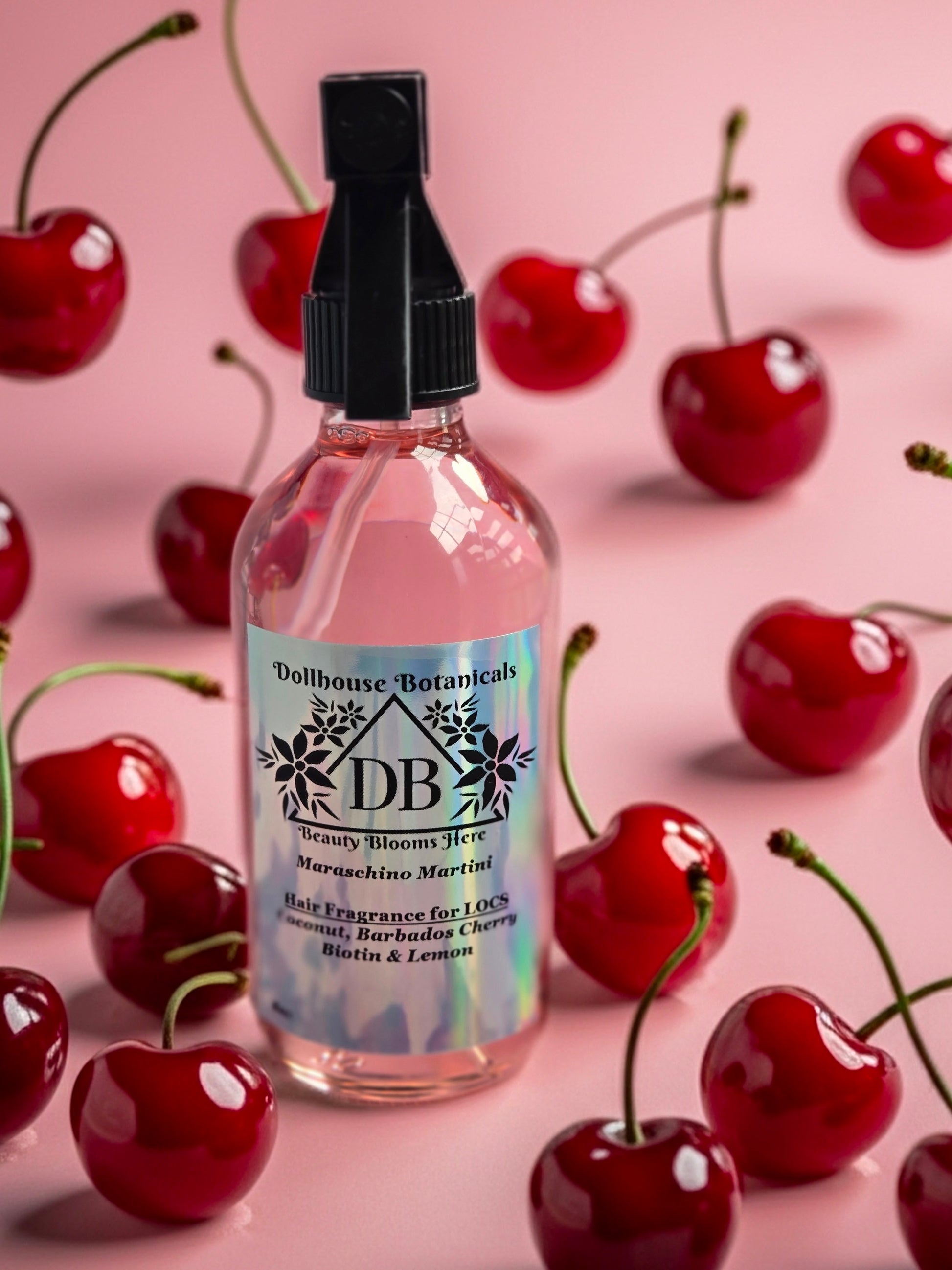 pink glass bottle with sprayer