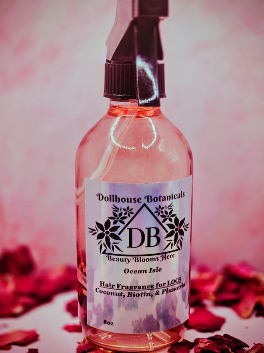 Dollhouse Botanicals Ocean Isle Hair Fragrance for locs botanical oil in pink glass bottle with black sprayer