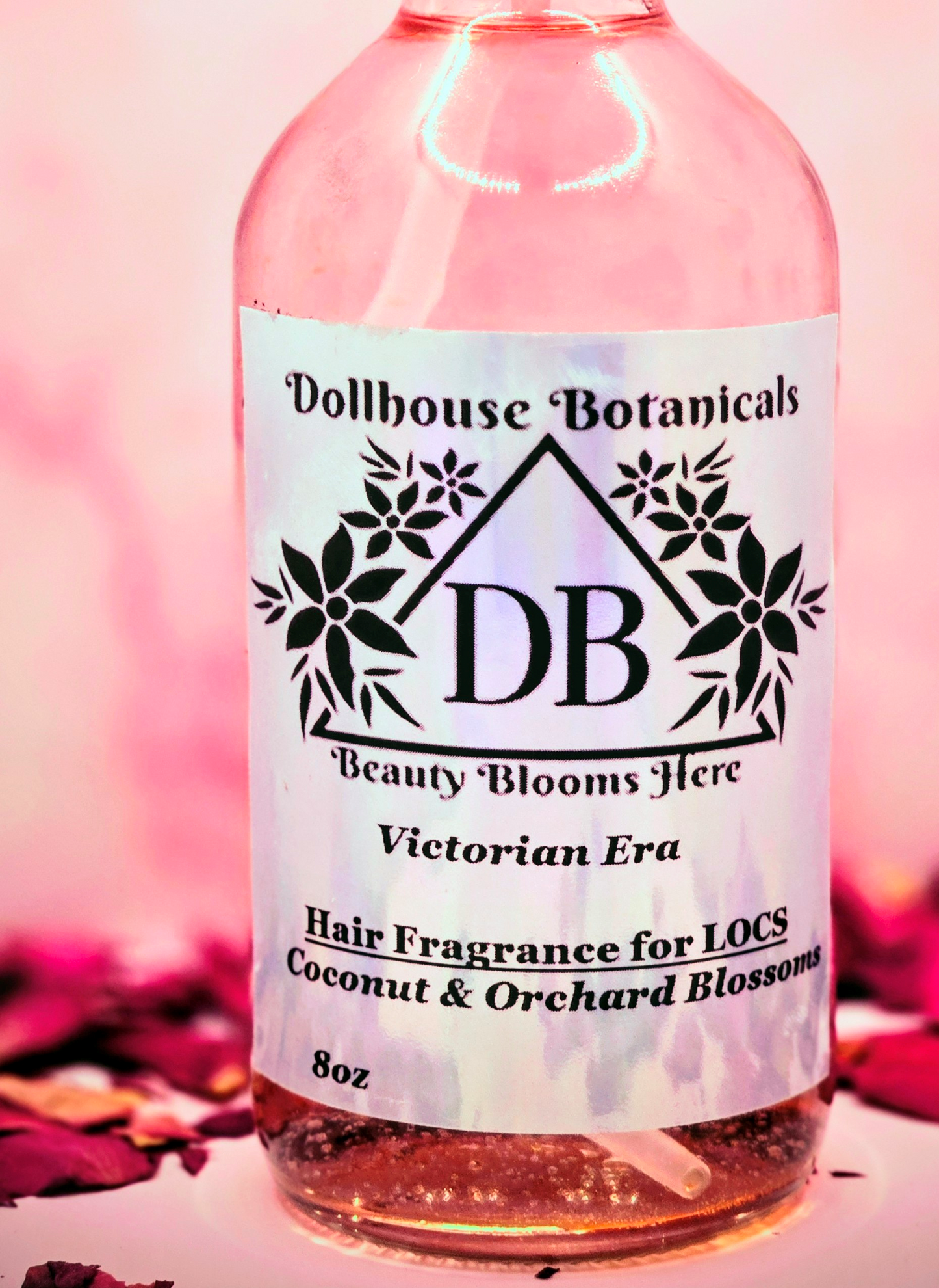 Dollhouse Botanicals Victorian Era Hair Fragrance for locs botanical oil in pink glass bottle with black sprayer